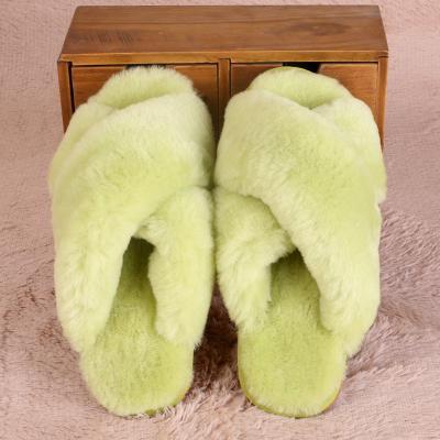 China Wholesale fashion trend indoor sheepskin and wool all-in-one slippers for women's cotton mop winter warmth thickened wool slides for sale