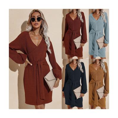 China Anti-wrinkle Autumn And Winter Lace-up V-Neckline Long Sleeve Women Knitted Dress Casual Solid Color Midi Female Sweater Dresses With Belt for sale