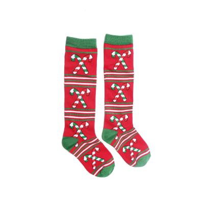 China Polyester Customized Amazon Fall and Winter Ladies Theme Christmas Socks Atmosphere Candy Snowflake Socks for sale