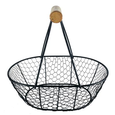 China Traditional Woven Oval Wire Basket Fruit Storage Basket Fruit Basket Metal Wire Egg Holder for sale