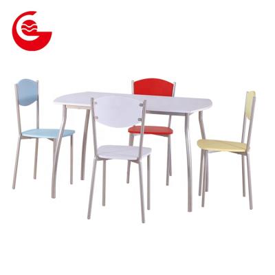 China Convertible cheap pipe frame MDF board dining furniture table and chair for sale for sale