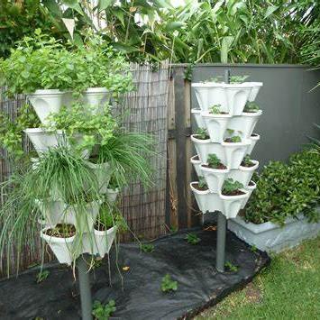 China Modern Inexpensive Vertical Hydroponic Flower Pots Tower Garden for sale