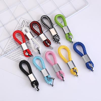 China Custom LOGO Decoration Braided Rope Car Key Chain Pendant Metal Leather Rope Key Chain Accessories Hooves Buckle Car Metal Key Chain for sale