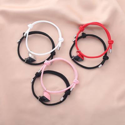 China CLASSIC 2Pcs/Set Red Black Heart Magnet Bracelet For Couples For Jewelry Men And Women Gifts Adjustable Bracelets for sale