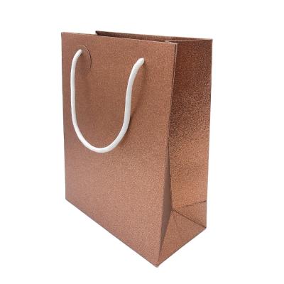 China Glitter Recyclable Custom Paper Gift Bags With Ribbon Handles Manufacturer Good Quality Professional Paper Bag for sale