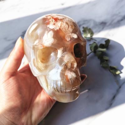 China High Quality Natural Cherry Blossom Agate Flower Agate Skulls China Gemstone Human Skulls For Home Decor for sale