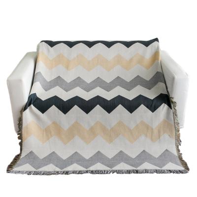 China Double New PORTABLE Side Wave Design Jacquard Woven Leisure Sofa Couch Cover Geometric Stripe Coverings With Fringe Tassel for sale