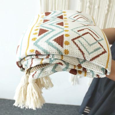 China New Design Anti-pull Knit Ins Bohemian Soft Geometric Cotton Chunky Knitted Blankets With Tassels for sale