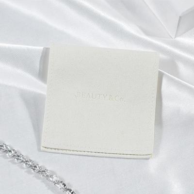 China Multifunctional Pouch Logo Beige Luxury Microfiber Custom Jewelry Packaging Bag Small Gift Jewelry Pouch for sale