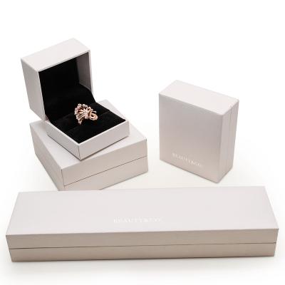 China Luxury Packaging OEM ODM Custom Logo Fashion White Ring Necklace Bracelet Earring Jewelry Box for sale