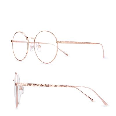 China Rimless Glasses Frame Luxury18k Gold Glasses Frames Shape Customizable Eyewears Natural Gem Diamond Glasses for sale