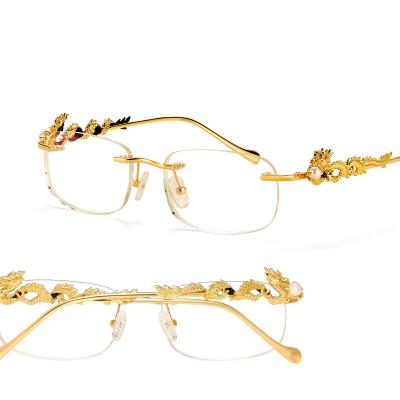 China Rimless Glasses Frame Luxury18k Gold Glasses Frames Shape Customizable Eyewears Natural Gem Diamond Glasses for sale