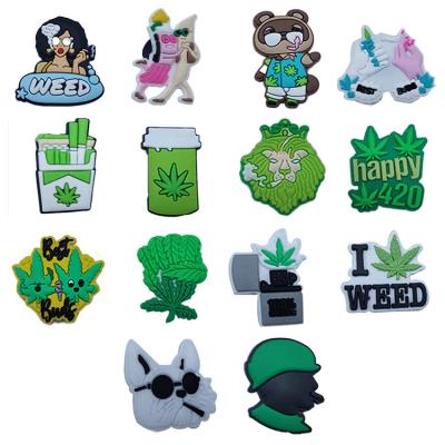 China Soft Hot Selling PVC Green Plant Black Girl's Magic Shoe Charms Kids Accessories Buttons For Kids Shoes Decoration Props for sale