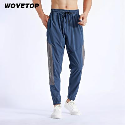 China Fashion QUICK DRY Wholesale Custom Quick-Drying Breathable Men Running Sports Polyester Training Track Gym Pants And Trousers for sale