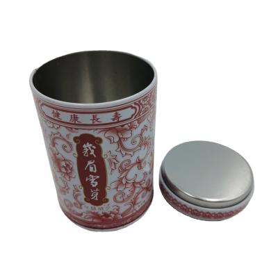 China 2022 Food Design Hot Round Christmas Metal Handle Decorative Tea Tin Box For Candy for sale