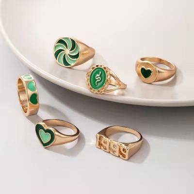 China Factory Direct Sale 1999 Love Windmill Snake Shape Oil Dripping 6-Piece Ring Punk Green Female for sale