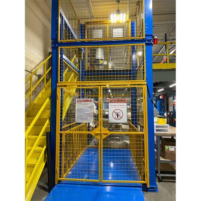 China Building Material Shops Goods Lift 2000kg Electric Hydraulic Warehouses Cargo Lift for sale