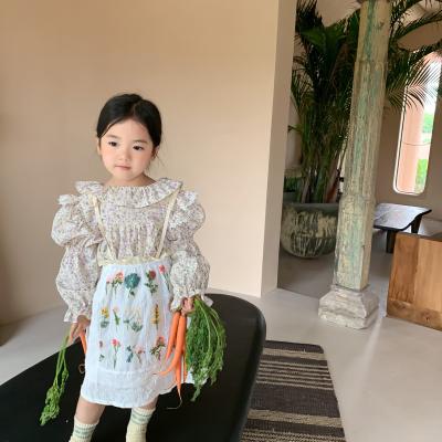 China High Quality Children's Autumn Clothing 100%Cotton Floral Print Shirt Kids Girls Smocked Breathable Blouse for sale