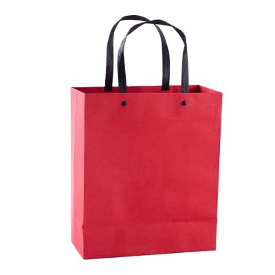 China Recyclable Customized Reusable Jewelry Garment Gift Packaging Kraft Paper Shopping Bag With Rivet Handle for sale