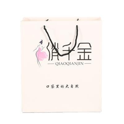 China Recyclable Custom Logo Printing Cheap Recycled Shopping Paper Bag With Carrier Handle for sale