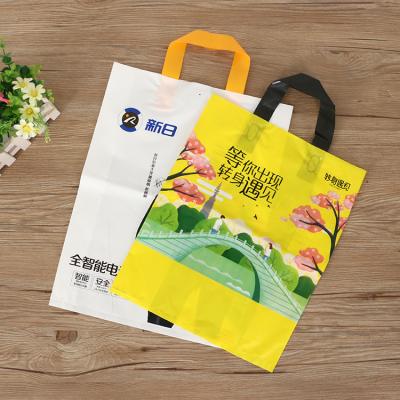 China BIODEGRADABLE Custom Printed Side Gusset Die Cut Plastic Bag PE Handle Shopping Bag With Your Own Logo for sale