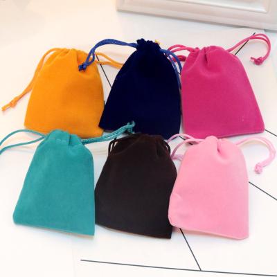 China Recyclable 100pcs/lot Newebrand Drawstring Velvet Bag for Jewelry Packaging Mass-produced Colorful Highly Textured Items gift organizer for sale