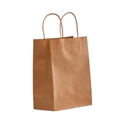 China Recycled Materials Wholesale Price Brown Kraft Paper Bag With Custom Print Logo Shopping Paper Bag for sale