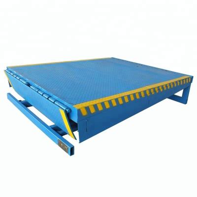 China Safety Easy Convenience Adjustable Stationary Container Cargo Unloading Ramps 8 Ton Dock Leveler Warehouse For Truck Loading for sale