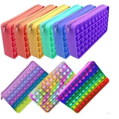 China Rainbow Color Press Silicone Decompression Bubble Pencil Case Pure Storage Bag Waterproof Shockproof Dustproof Pencil Cases Simple Version for sale