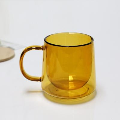 China High Borosilicate 350ml Heat Design Sustainable Cute Glass Cup Double Wall Mug With Color Handle for sale