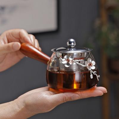 China Heat Resistant Glass Side Handle Teapot Water Separation Stainless Steel Coating Glass Tea Making Device Household High Temperature Resistant Tea for sale