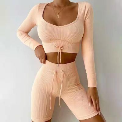 China 2022 New Antibacterial Yoga Sets Lift Up Buttocks Show Buttocks Fishing Pants Fitness Sets Pull Rope Seamless Knitted Sportswear for sale