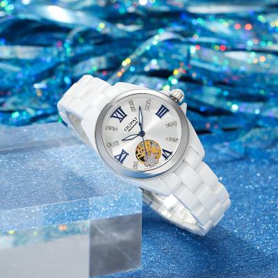 China OUPAI 2022 New Arrival Water Resistant Hollow Quartz Fashion And Elegant Watch Woman Waterproof Luxury White Ceramic Wristwatch Lady for sale