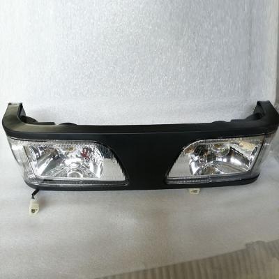 China 12V.65 tractor curved accessories tow.604.704 Foton Oubao tractor headlight for sale