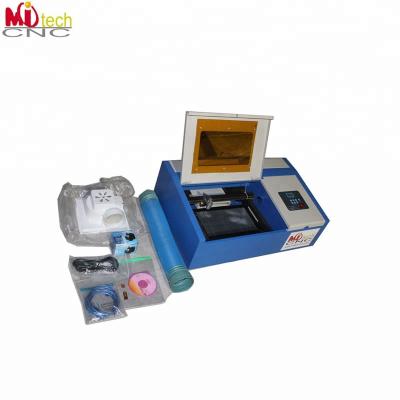 China Laser Engraving Cheap Laser Rubber Stamp Laser Making Machine Mini Laser Cutting Machine for sale