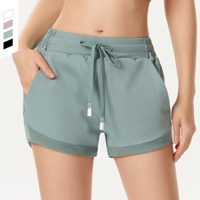 China Women Sustainable 2 Pieces Yoga Shorts Summer Hot Pants Safe Breathable Lace Up Sports Running Shorts Safe Breathable for sale