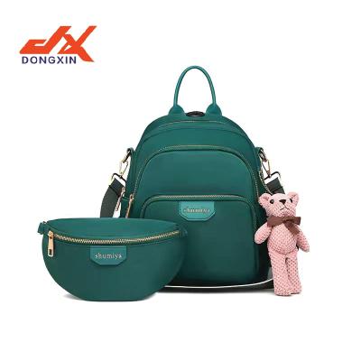 China 2021 new arrival OEM college bagpack custom made waterproof nylon maniac bear anti-theft charms ladies casual backpacks set for sale