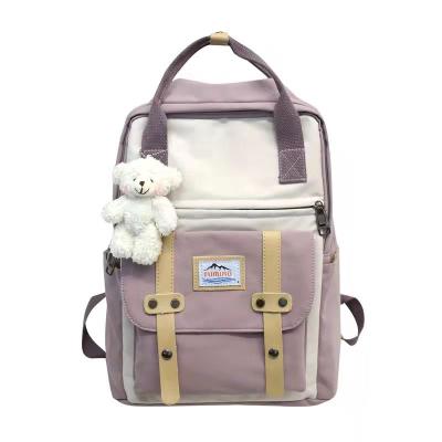 China With USB designer girl schoolbag college style charm bear backpack fashionable ladies casual backpack for sale