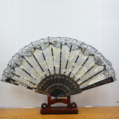 China China 7 Inch Hollow Lace Bent Bamboo Hand Dance Fan Chinese Style for sale