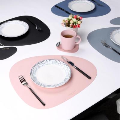 China Europe Sustainable Leather Irregular Table Dining Mat Table Decorative Table Mats Sets Place Mat for sale