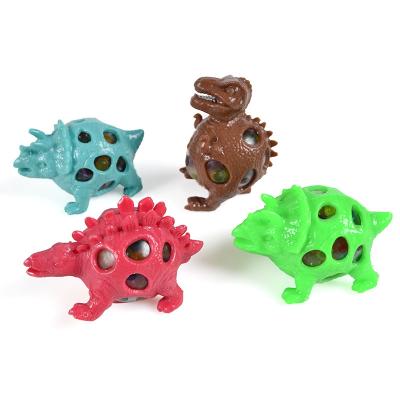 China New and strange multi-color children's creative new type pinch dinosaur duct ball decompression color dinosaur toy for sale