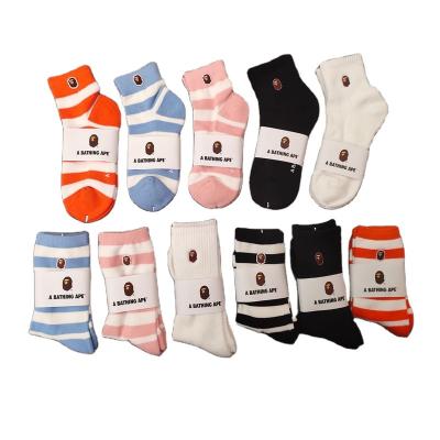 China 2023 Hot Selling Bape QUICK DRY Teen Socks High Hose Lower Bape Monkey Head Towel Socks Street for sale