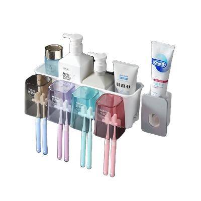 China Sustainable Excellent Design Toothpaste Dispenser PP+PS Bathroom Wall Mounted Toothbrush Holder for sale