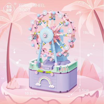 China DIY TOY New Arrival 3.6 Merry Disappear Round Ferris Wheel Music Box Assembled Building Blocks Holiday Toy Gifts for sale