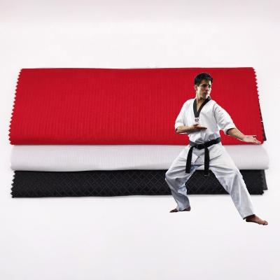 China Anti pill polyester cotton jacquard black red white itf dobok uniform Taekwondo fabrics for sale