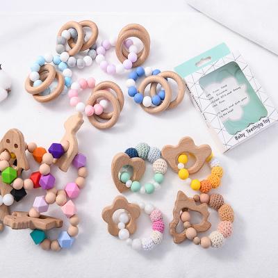 China BPA Free Wholesale Organic Silicone Beads Bracelet Teether WoodenTeething Ring With for sale