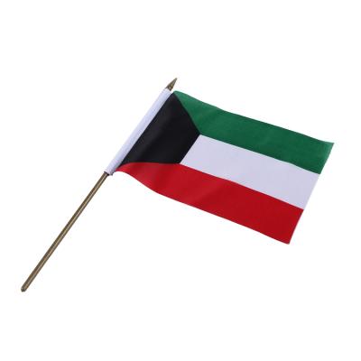 China Polyester Wholesale Custom Wooden Stick Hand Held Flags All National Hand Design Waving Flag of Kuwait for sale