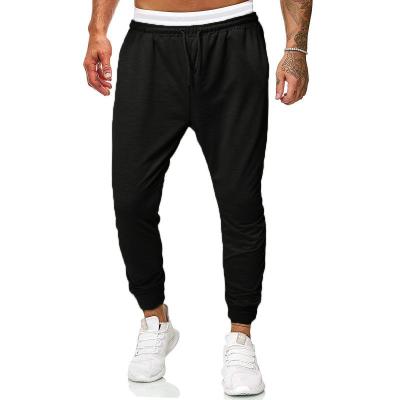 China Anti-wrinkle Casual Men's Tracksuit Pants Solid Color String Cotton Pants Spring Autumn Men Casual Trousers for sale