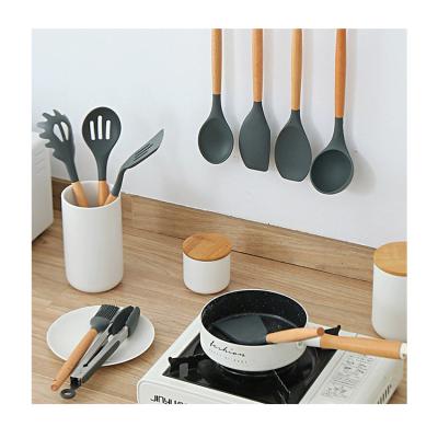 China Sustainable High Grade New Design Cooking Spoon Shovel Wooden Handle Silicone Kitchen Set 11 Pieces for sale