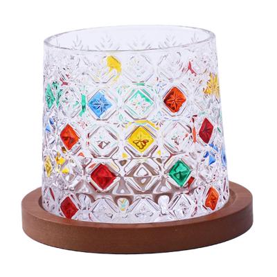 China Creative Hand Painted Rotating Statistical Whiskey Glass Decompression Cup Stocked High Quality and Good Prices for sale